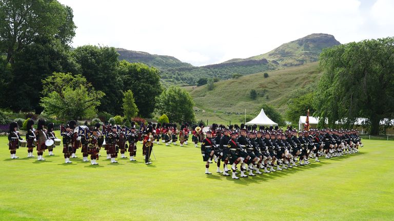 Soldiers of the Royal Regiment of Scotland prepare for the arrival of King Charles III ahead of the Ceremony of the Keys on the forecourt of the Palace of Holyroodhouse in Edinburgh, which is part of his trip to Scotland for Holyrood Week. Picture date: Tuesday July 2, 2024.