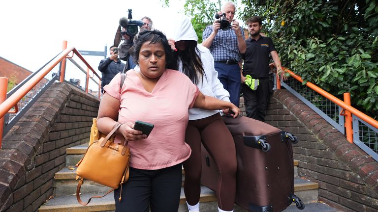 De Sousa Abreu (in the white jumper) leaving court. Pic: PA