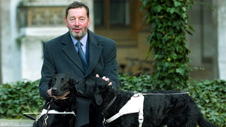 Lord Blunkett with his new guide dog Sadie (r) and his old guide dog Lucy in 2003. Pic: Reuters