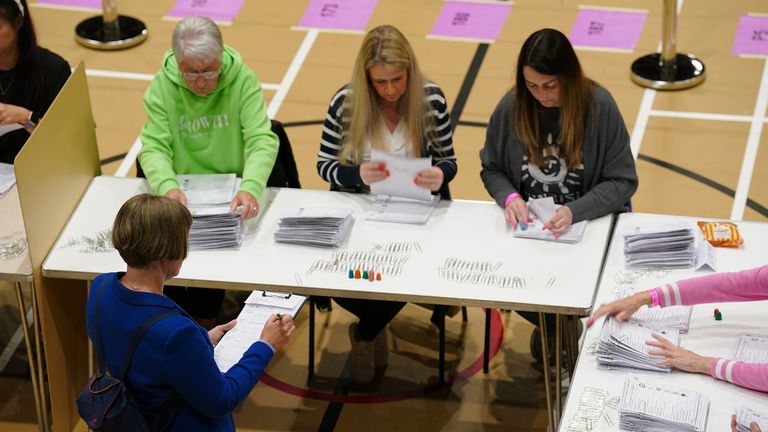 A count verifier watches as ballots are sorted at Macclesfield Leisure Centre, in Cheshire, as the count begins for the 2024 General Election. Picture date: Thursday July 4, 2024. PA Photo. See PA story POLITICS Election. Photo credit should read: Peter Byrne/PA Wire 