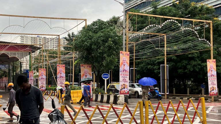 Posters of the prime minister lining the street. Pic: Reuters