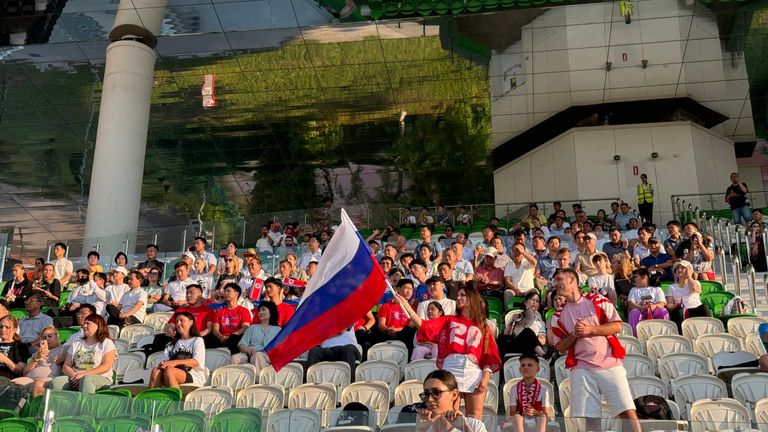 A crowd cheers at Russia's artistic swimming national team in Moscow