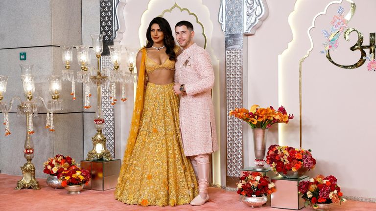 Nick Jonas and Priyanka Chopra pose for pictures on the red carpet.
Pic: Reuters