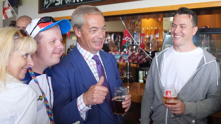 Nigel Farage and new Reform MP for South Basildon and East Thurrock, James McMurdock (right), during a visit to Wyldecrest Sports Country Club.
Pic: PA