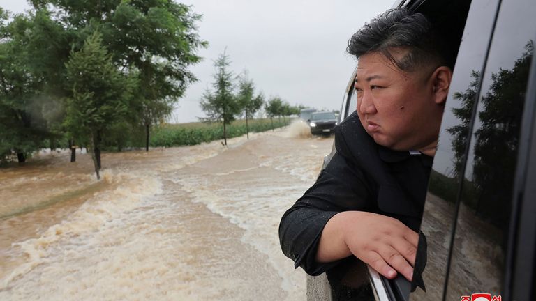 In this photo provided by the North Korean government, North Korean leader Kim Jong Un inspects a flood-hit area in North Phyongan province, North Korea Sunday, July 28, 2024. Independent journalists were not given access to cover the event depicted in this image distributed by the North Korean government. The content of this image is as provided and cannot be independently verified. Korean language watermark on image as provided by source reads: "KCNA" which is the abbreviation for Korean Central News Agency. (Korean Central News Agency/Korea News Service via AP)