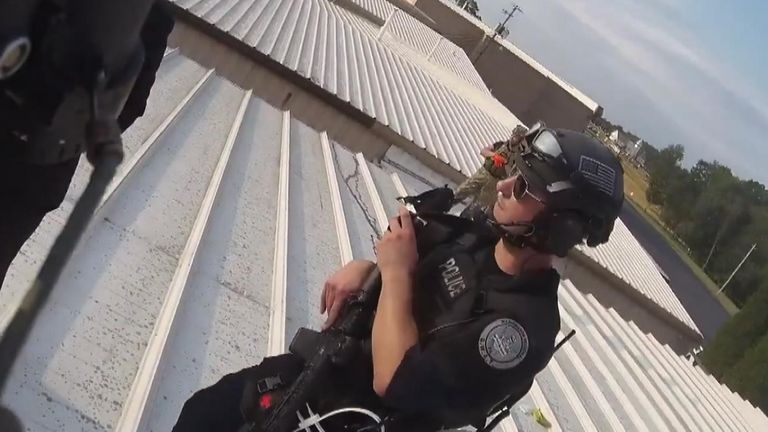 This new bodycam footage shows the aftermath of the killing of Trump gunman Thomas Crooks, with officers on a rooftop alongside his body.