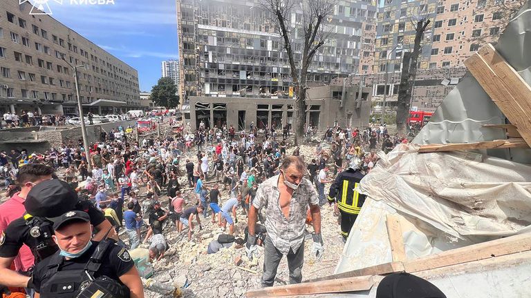 Rescuers at the site of the hospital after the blast. Pic: AP