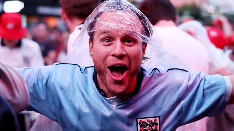 Olly Murs celebrates after England's Harry Kane scores their first goal.
Pic: Reuters