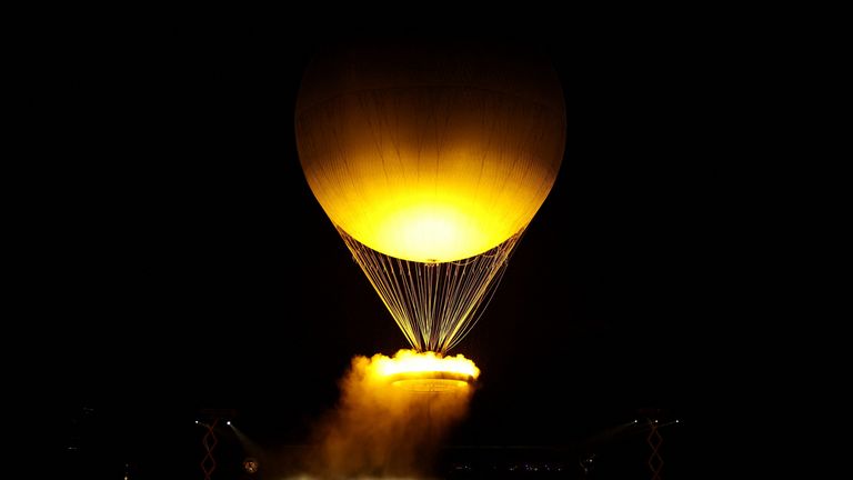 The Olympic cauldron is seen after being lit during the opening ceremony