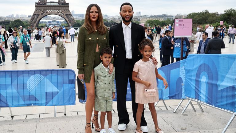 John Legend and his wife Chrissy Teigen arrives at the Trocadero ahead of the opening ceremony for the Paris 2024 Olympic Games. 
Pic: PA