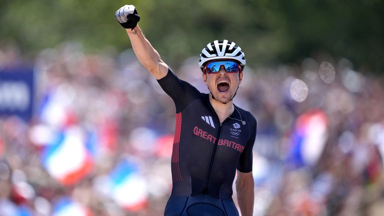 Great Britain's Tom Pidcock crosses the line to win gold during the men's cross-country mountain bike. Pic: PA