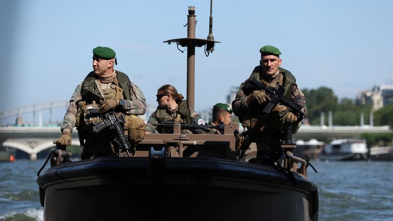 Soldiers patrol on the Seine. Pic: AP