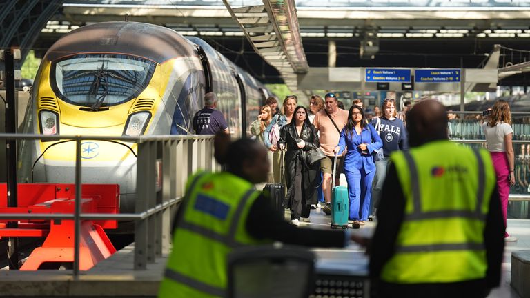 Passengers arrive by train at the Eurostar terminal at St Pancras station.
Pic: PA