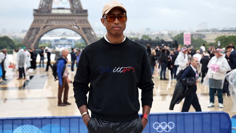 Pharrell Williams arrives at the Trocadero ahead of the opening ceremony.
Pic: PA