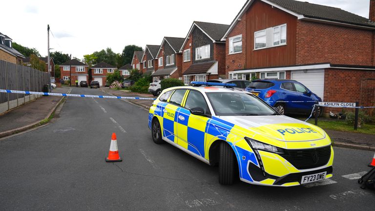 Police at the scene in Ashlyn Close, Bushey.
Pic:PA