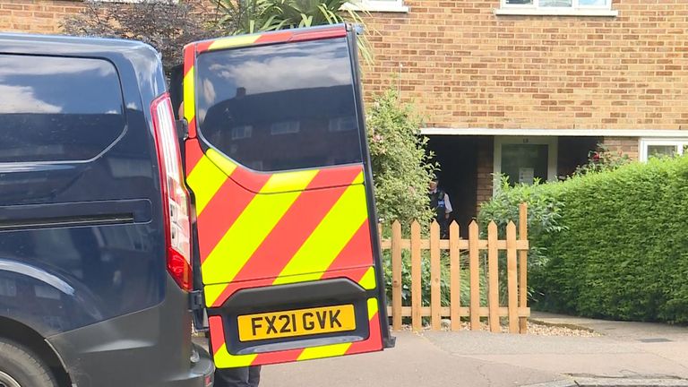 Police staff were seen outside a property in Enfield this morning