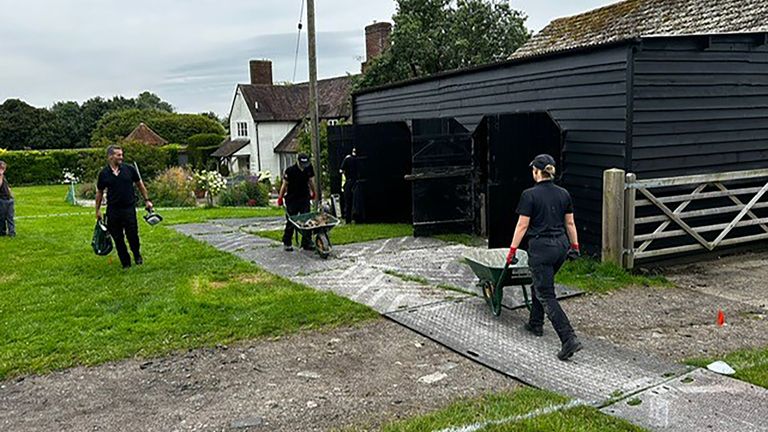 Police officers searching inside a barn at a Hertfordshire farm for the remains of Muriel McKay.
Pic: Met Police/PA