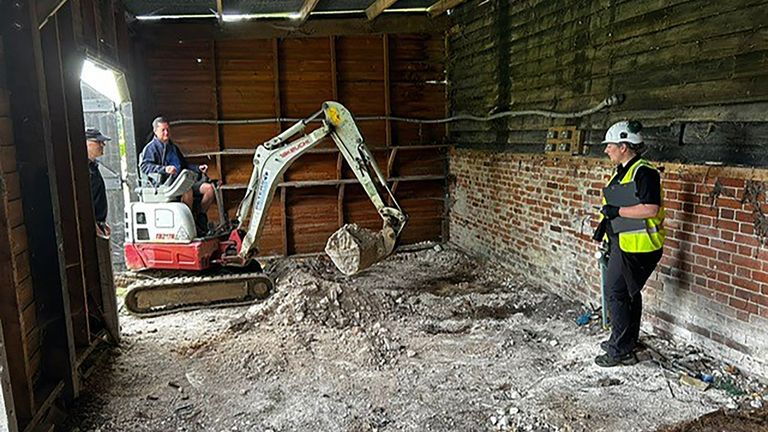 Police officers searching inside a barn at a Hertfordshire farm for the remains of Muriel McKay.
Pic: Met Police/PA