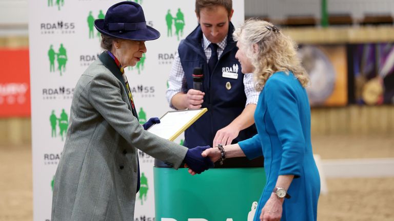 The Princess Royal presents an award during the Riding for the Disabled Association (RDA) National Championships at Hartpury University and Hartpury College in Gloucestershire. Picture date: Friday July 12, 2024.
