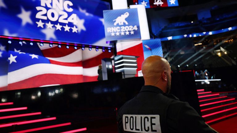 A police officer stands on the floor ahead of the Republican National Convention in Milwaukee, Wisconsin, U.S., July 14, 2024. REUTERS/Brian Snyder