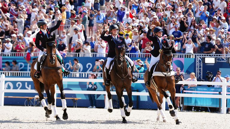 Rosalind Canter, Tom McEwen and Laura Collett with their gold medals.
Pic:PA