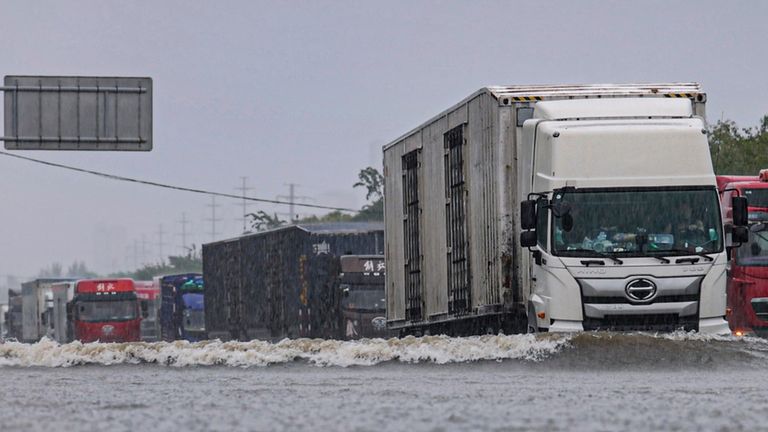 Roads flooded in Shenyang, northeastern China on Friday. Pic: AP