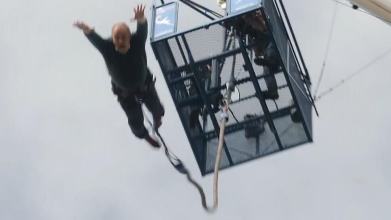Sir Ed Daves performs a bungee jump on the election campaign