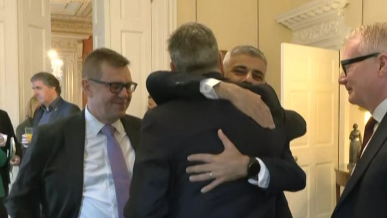 Sadiq Khan embraces Sir Keir Starmer at a meeting in Downing Street