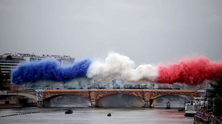 Smoke clouds in the tricolours of the France flag are seen at Pont d'Austerlitz during the opening ceremony.
Pic Reuters