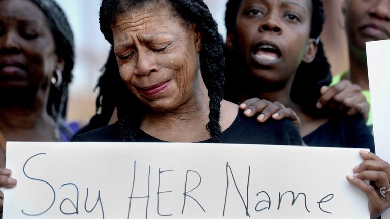 Donna Massey on a march for her daughter Sonya. Pic: Reuters