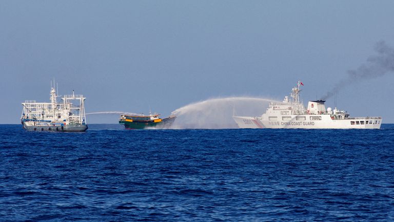 Chinese Coast Guard vessels fire water cannons towards a Philippine resupply vessel Unaizah May 4 on its way to a resupply mission at Second Thomas Shoal in the South China Sea,.Pic: Reuters