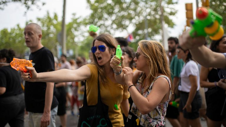 Demonstrators sprayed tourists with water pistols as part of demonstrations this month. Pic: AP