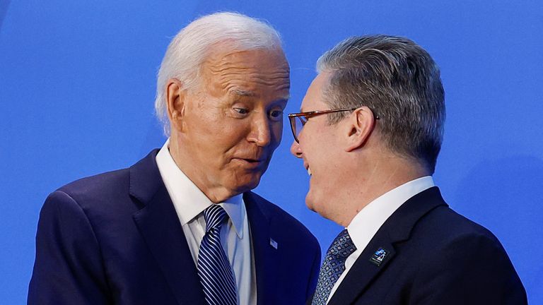 U.S. President Joe Biden speaks with Britain's Prime Minister Keir Starmer, as they attend NATO's 75th anniversary summit in Washington, U.S., July 10, 2024. REUTERS/Evelyn Hockstein