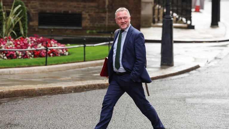 Steve Reed walks outside Downing Street on the day of the first cabinet meeting.
Pic: Reuters