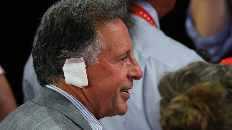 An attendee wears a bandage in reference to the injury suffered by Republican presidential nominee and former U.S. President Donald Trump in the assassination attempt.
Pic: Reuters