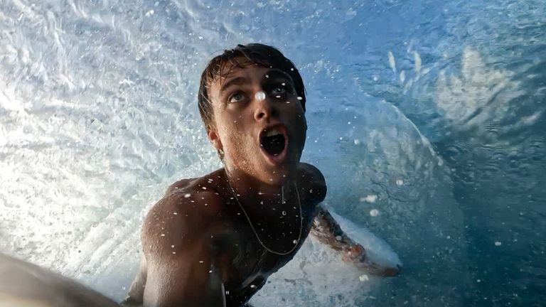 Vaast films himself under a wave in Tahiti. Pic: AP