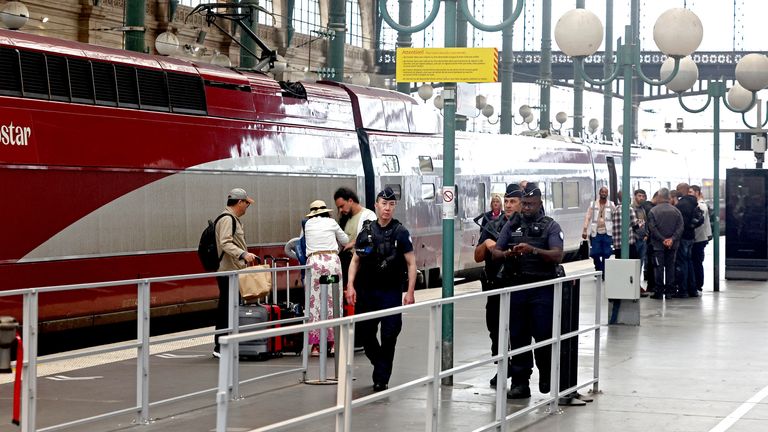 Police officers patrol Gare du Nord station after threats against France's high-speed TGV network.
Pic: Reuters