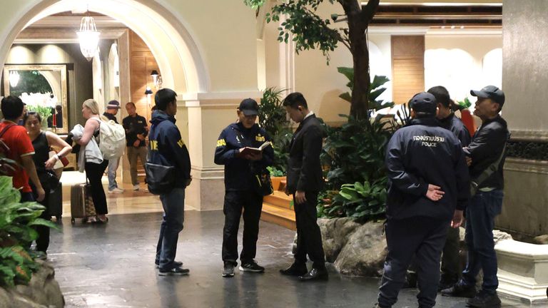 Police officers talk to a staff member at the Grand Hyatt Erawan Hotel in Bangkok, Thailand.
Pic AP