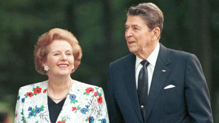 Former U.S. President Ronald Reagan (R) walks with former British Prime Minister Margaret Thatcher (L) during the annual G7 Summit in Toronto in this June, 1988 file photo. Reagan passed away at the age of 93, June 6, 2004. REUTERS/FILES/Gary Hershorn GMH
