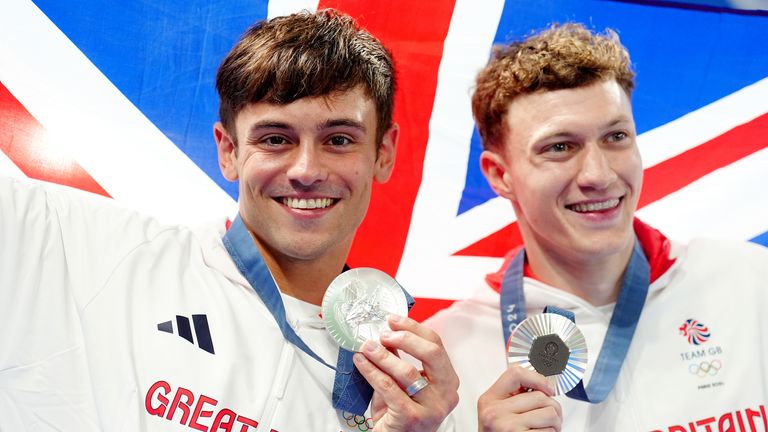 Noah Williams with diving partner Tom Daley after winning silver. Pic: PA