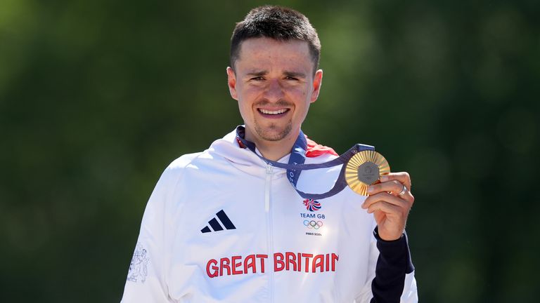 Tom Pidcock with his gold medal following the Men's Cross-country mountain bike at Elancourt Hill.
Pic: PA