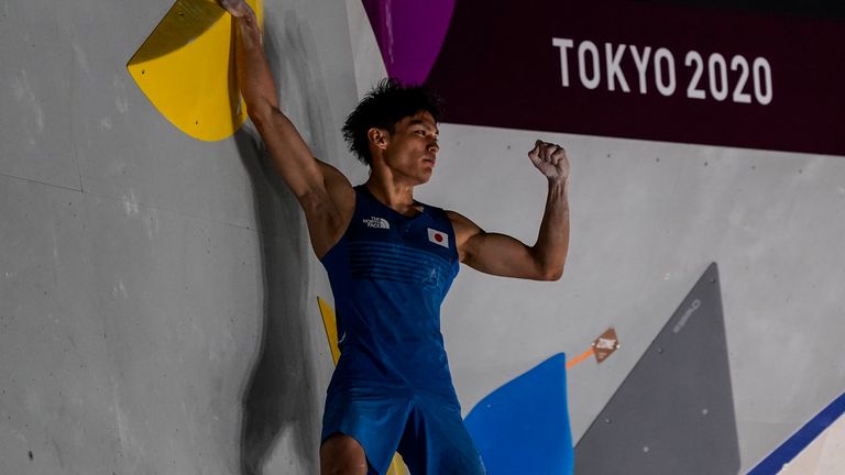 Japan's Tomoa Narasaki celebrates during bouldering portion of the men's sport climbing final at the 2020 Olympics. Pic: AP