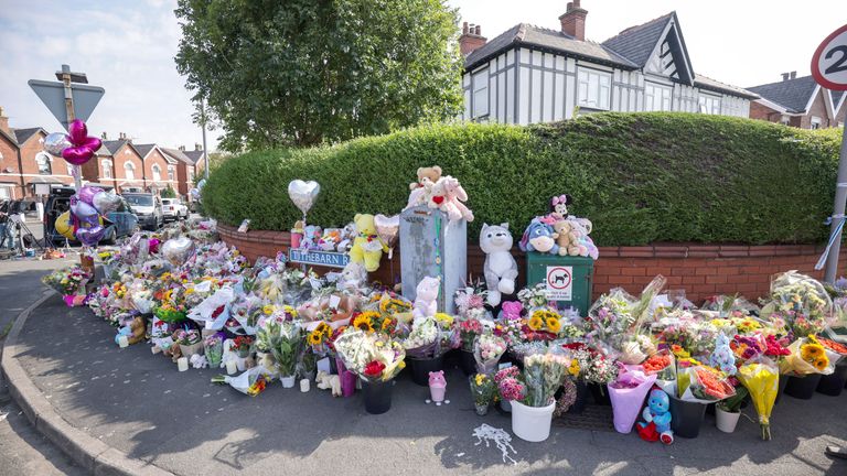 Tributes on the junction of Tithebarn Road and Hart Street in Southport..
Pic: PA