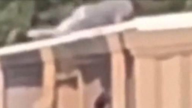 Moment gunman takes position on roof minutes before attack