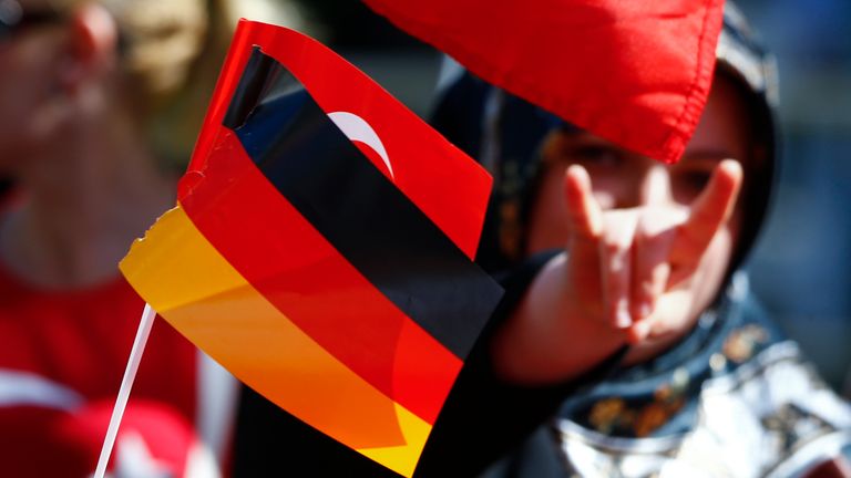 A Turkish woman gestures at a demonstration in Germany in 2016. Pic: Reuters