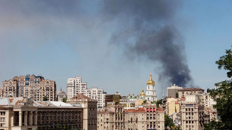 Smoke rises in the sky over the city after a Russian missile strike, amid Russia's attack on Ukraine, in Kyiv.
Pic: Reuters