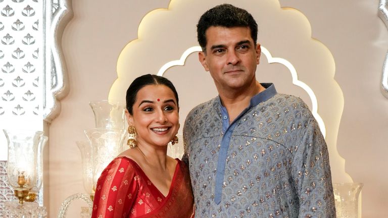 Indian actor Vidya Balan with her husband Siddharth Roy Kapur. Pic: AP