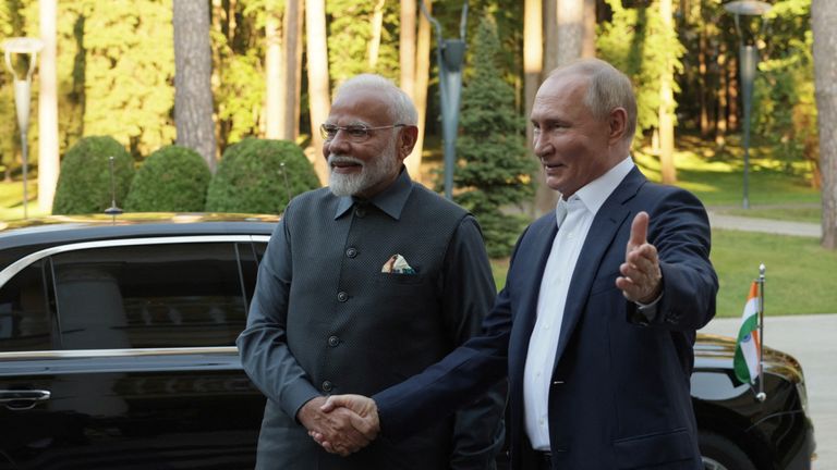 Russia's President Vladimir Putin and India's Prime Minister Narendra Modi shake hands during their meeting at the Novo-Ogaryovo state residence near Moscow, Russia July 8, 2024. Sputnik/Gavriil Grigorov/Pool via REUTERS ATTENTION EDITORS - THIS IMAGE WAS PROVIDED BY A THIRD PARTY.