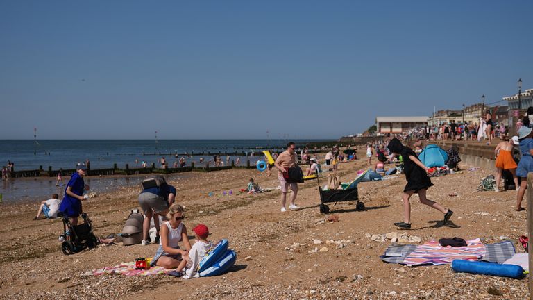 People enjoy the hot weather at Hunstanton beach, Norfolk. High temperatures could lead to an official heatwave, with much of the UK set to enjoy "very warm, locally hot weather" over the next few days. Picture date: Monday July 29, 2024. PA Photo. See PA story WEATHER Hot. Photo credit should read: Joe Giddens/PA Wire