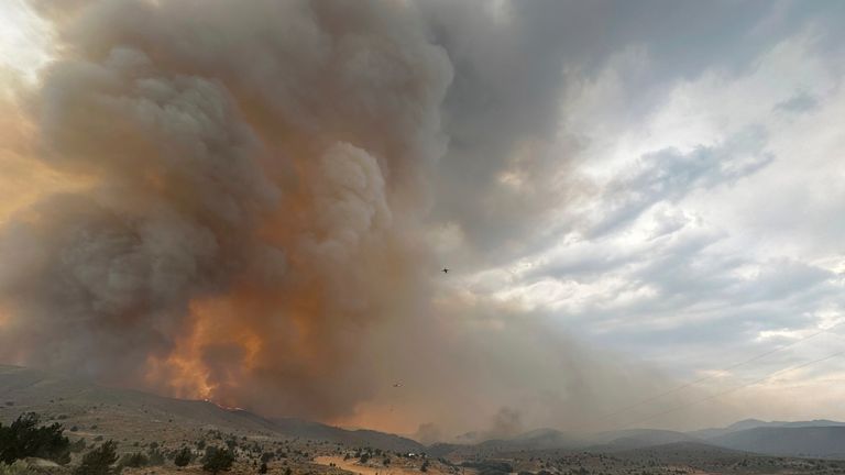 Smoke rises from a wildfire near Durkee, Oregon.  Photo: Brett Brown/USDA Forest Service via AP